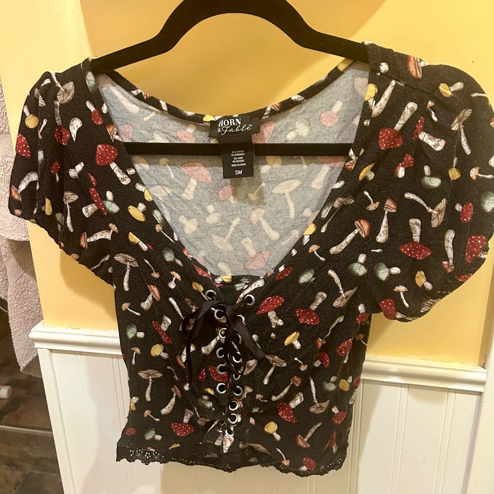 Thorn & Fable lace-up top with all over mushroom print. Purchased from Hot Topic